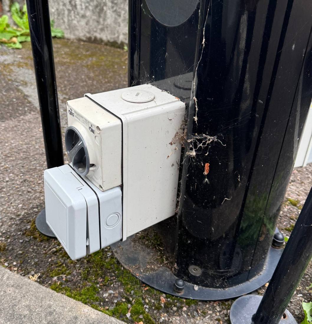 Isolator and outlet fitted at a car park charger