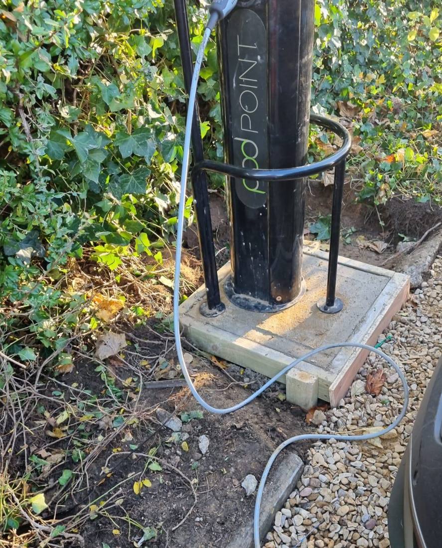 EV charger reinstalled on a new concrete base